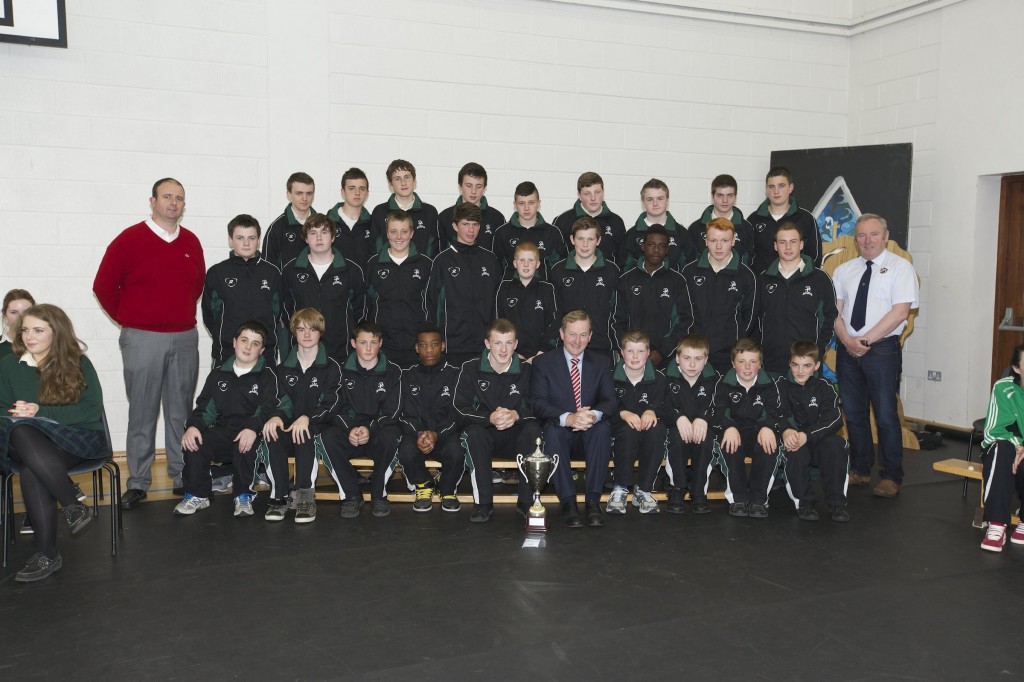 An Taoiseach, Enda Kenny TD pictured with the victorious Davitt College U16 Rugby Team that won the North West Championship Cup 2014. Accompanied with the team are Mr. Dave MacDonnacha, Teacher and Trainer (Left) and Mr. Seamus King, Trainer (Right). 